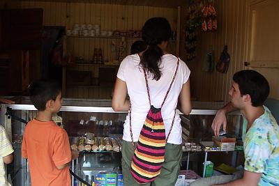 student buy groceries at the local store